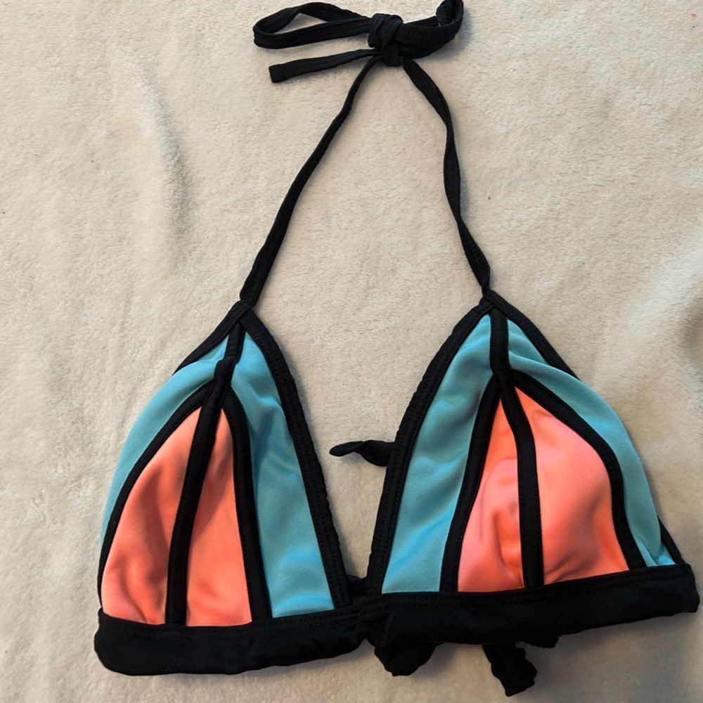 Bikini top really good quality perfect for beach days and other swim days !